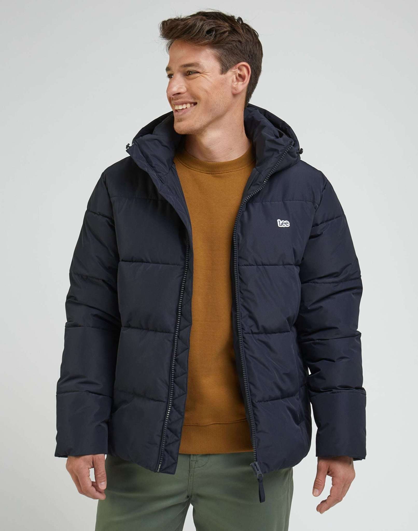 Puffer Jacket in Black Vestes Lee