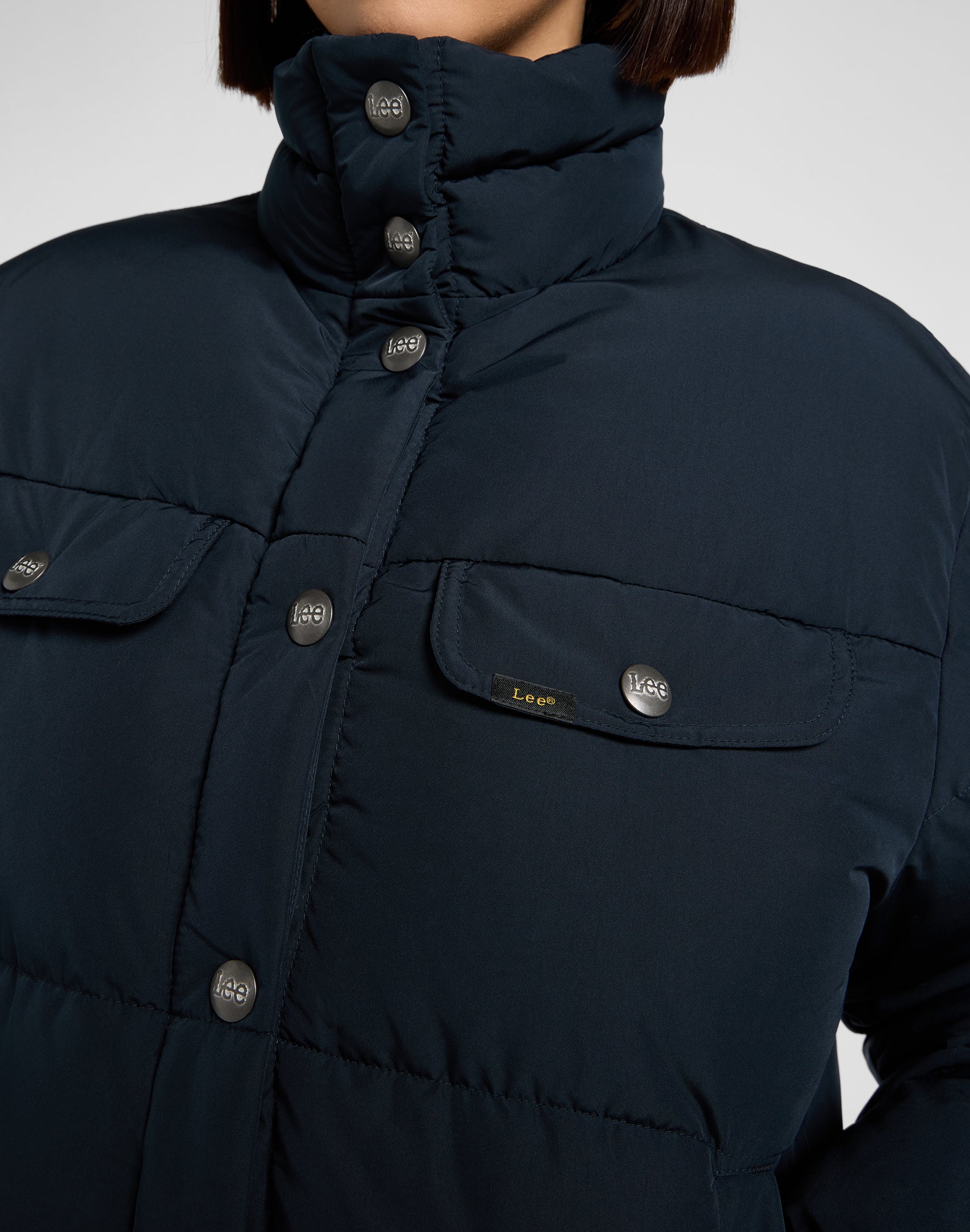 Rider Puffer Jacket in Black Vestes Lee