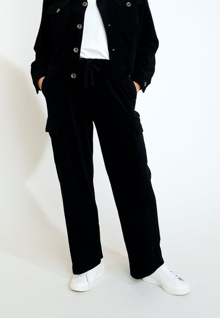 BEYOND-QUANDARY Pantalon de jogging en velours côtelé en Noir Pantalon Banana Moon