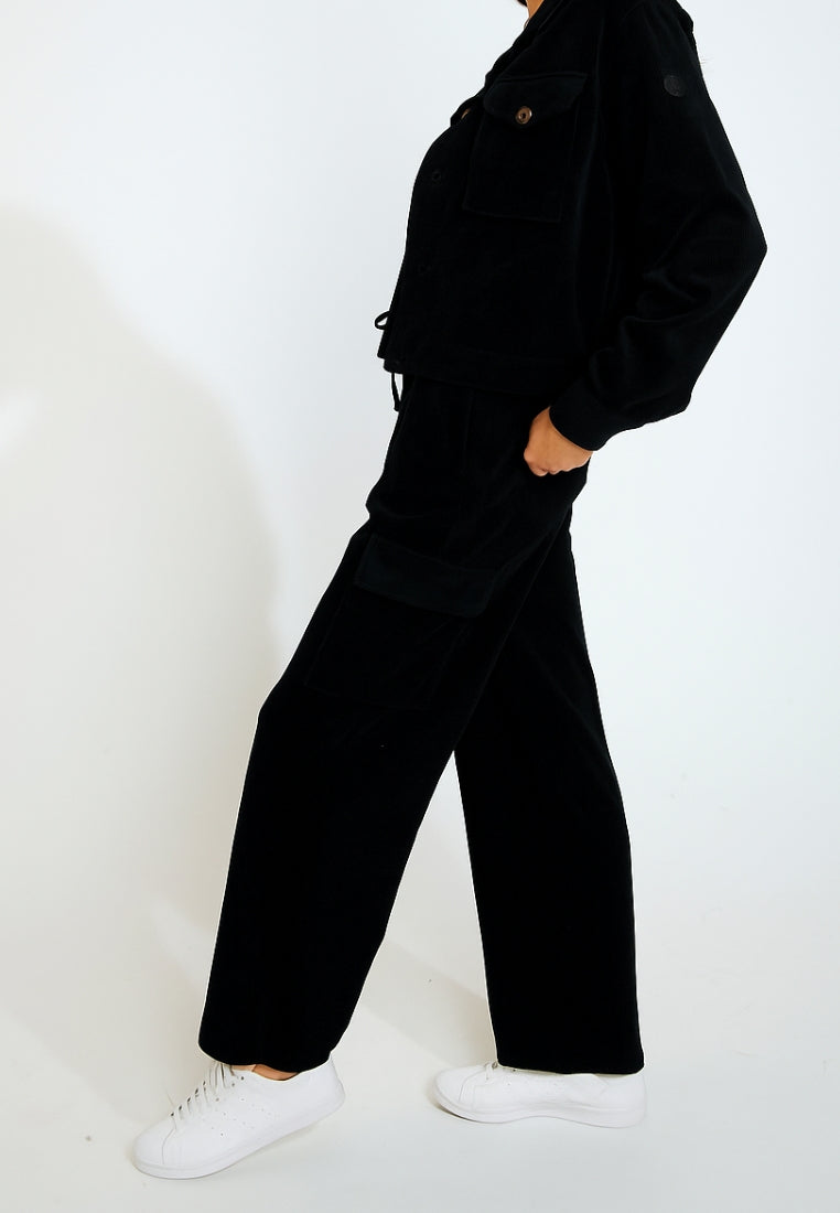 BEYOND-QUANDARY Pantalon de jogging en velours côtelé en Noir Pantalon Banana Moon
