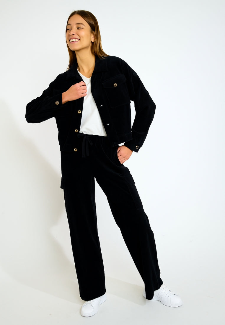 BEYOND-QUANDARY Pantalon de jogging en velours côtelé en Noir Pantalon Banana Moon