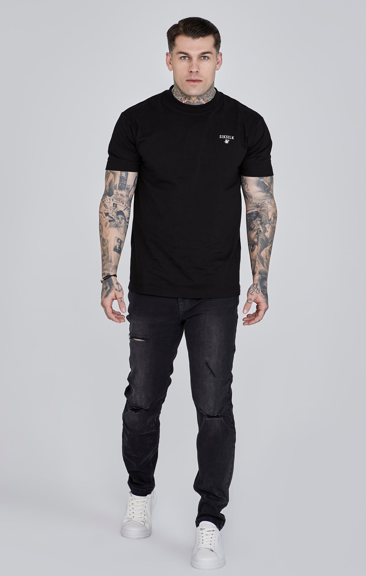 Jeans Distressed Slim Fit en noir Jeans SikSilk