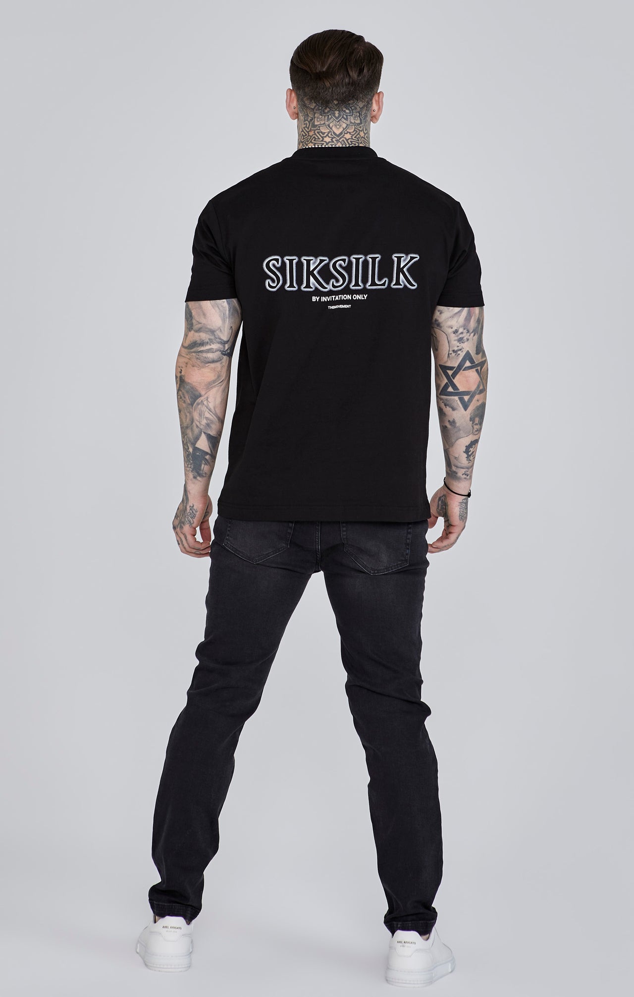 Jeans Distressed Slim Fit en noir Jeans SikSilk