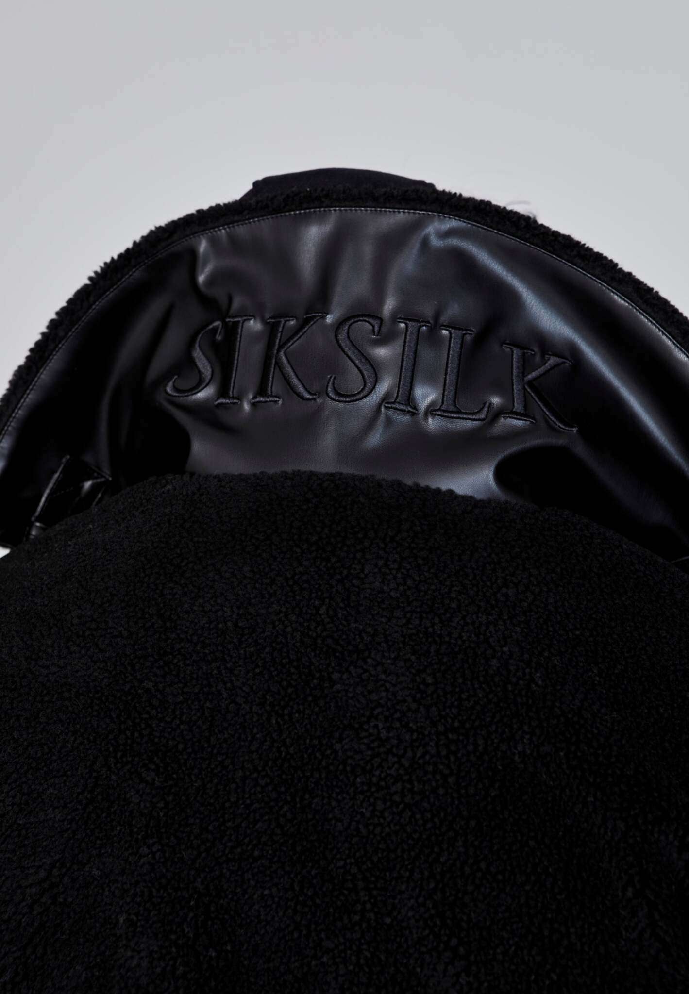 Sherpa Bomber Jacket in Black Vestes SikSilk