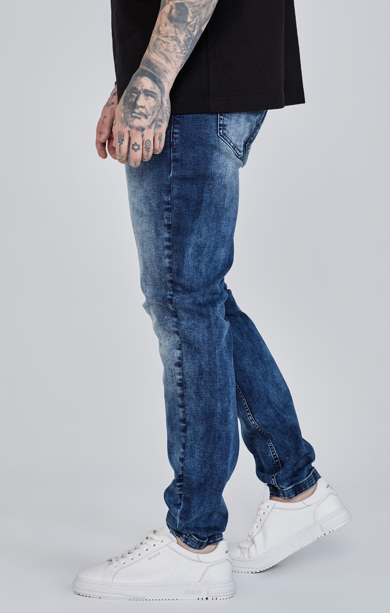 Distressed Slim Fit en bleu Jeans SikSilk