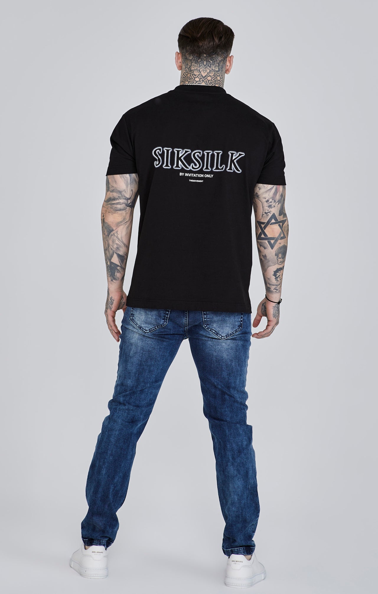 Distressed Slim Fit en bleu Jeans SikSilk