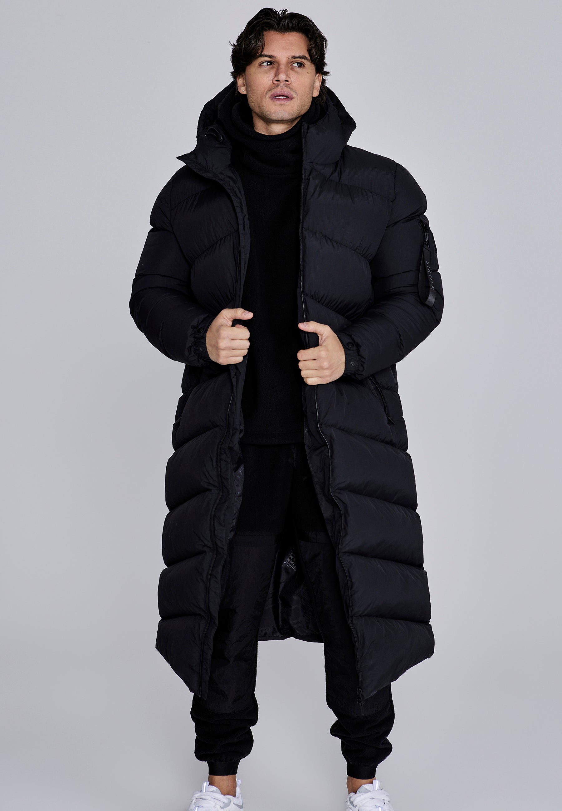 Longline Puffer in Black Vestes SikSilk