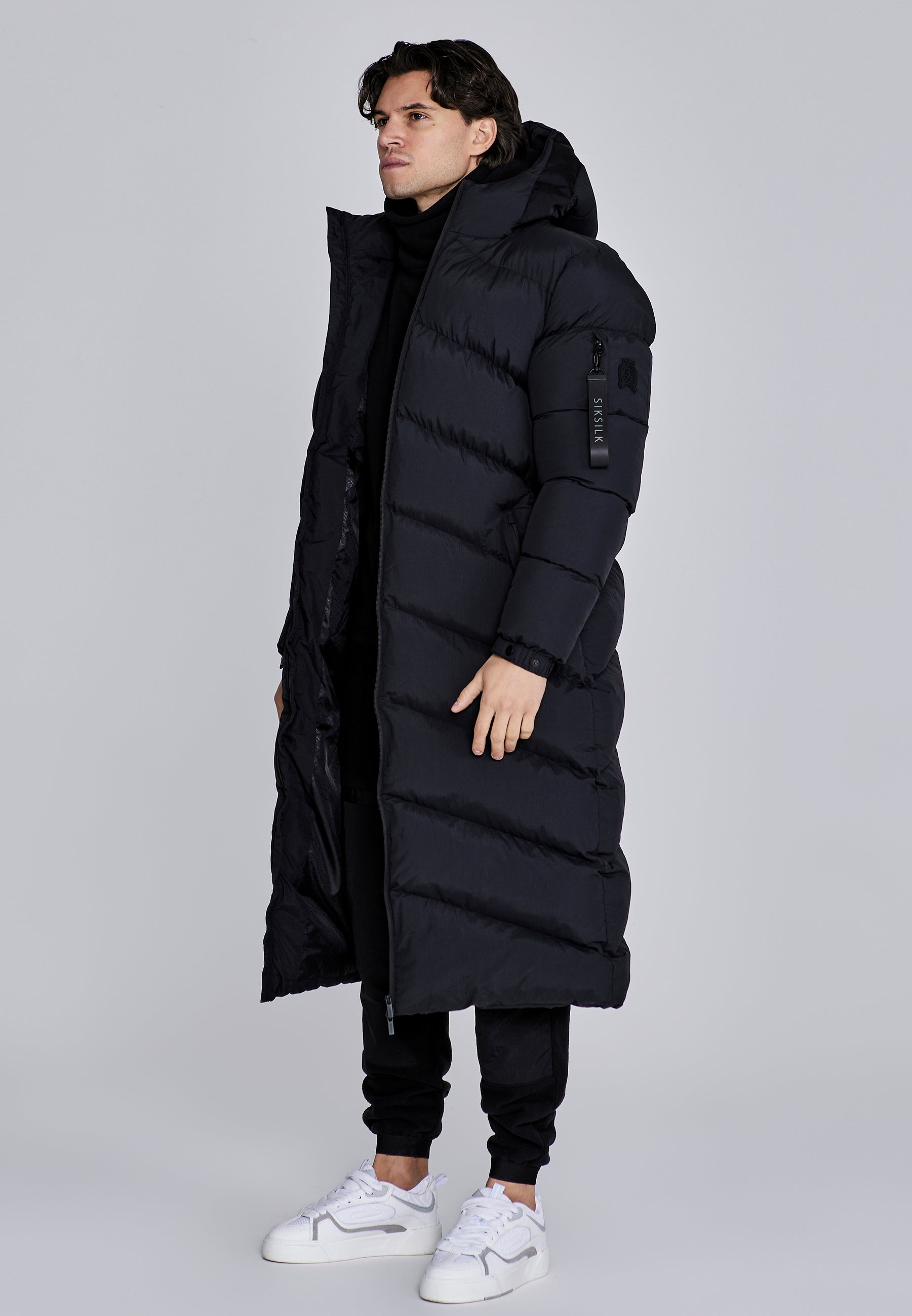 Longline Puffer in Black Vestes SikSilk