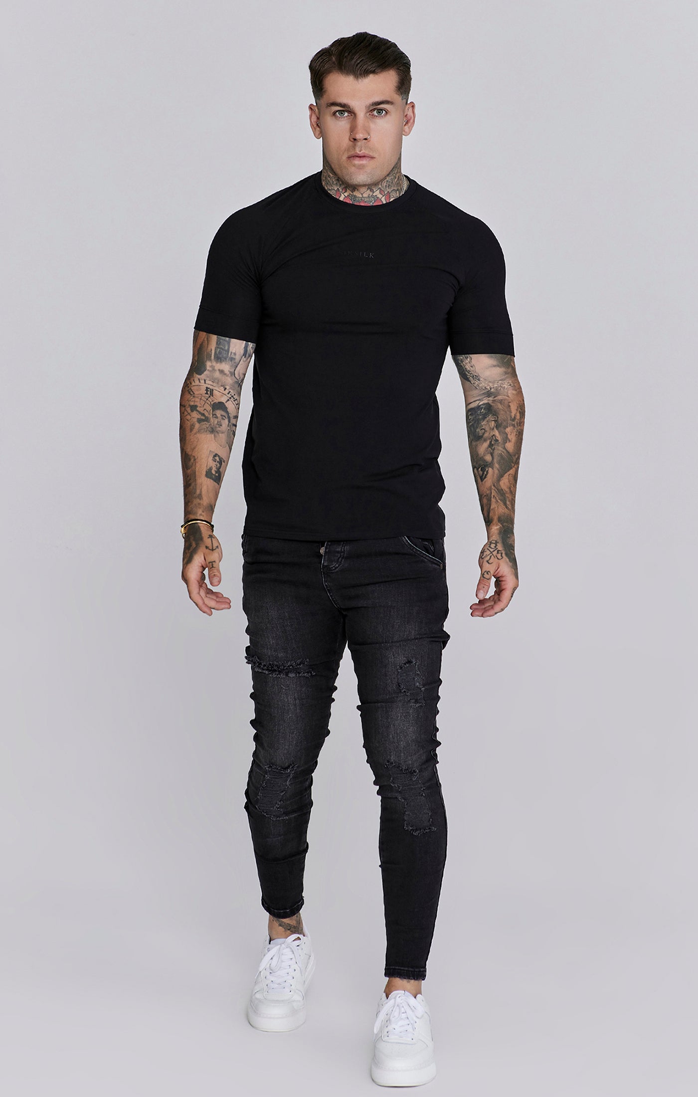Jeans Distressed Skinny en noir Jeans SikSilk