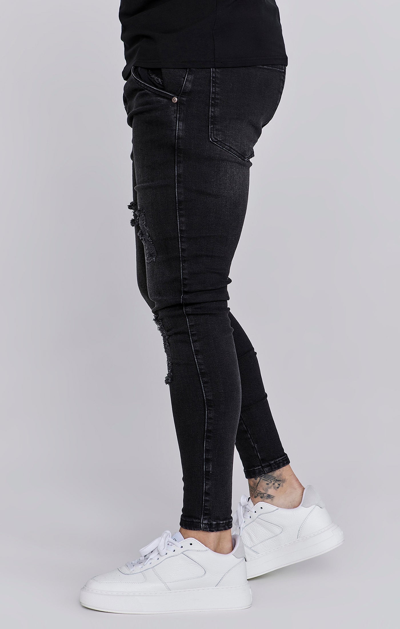 Jeans Distressed Skinny en noir Jeans SikSilk