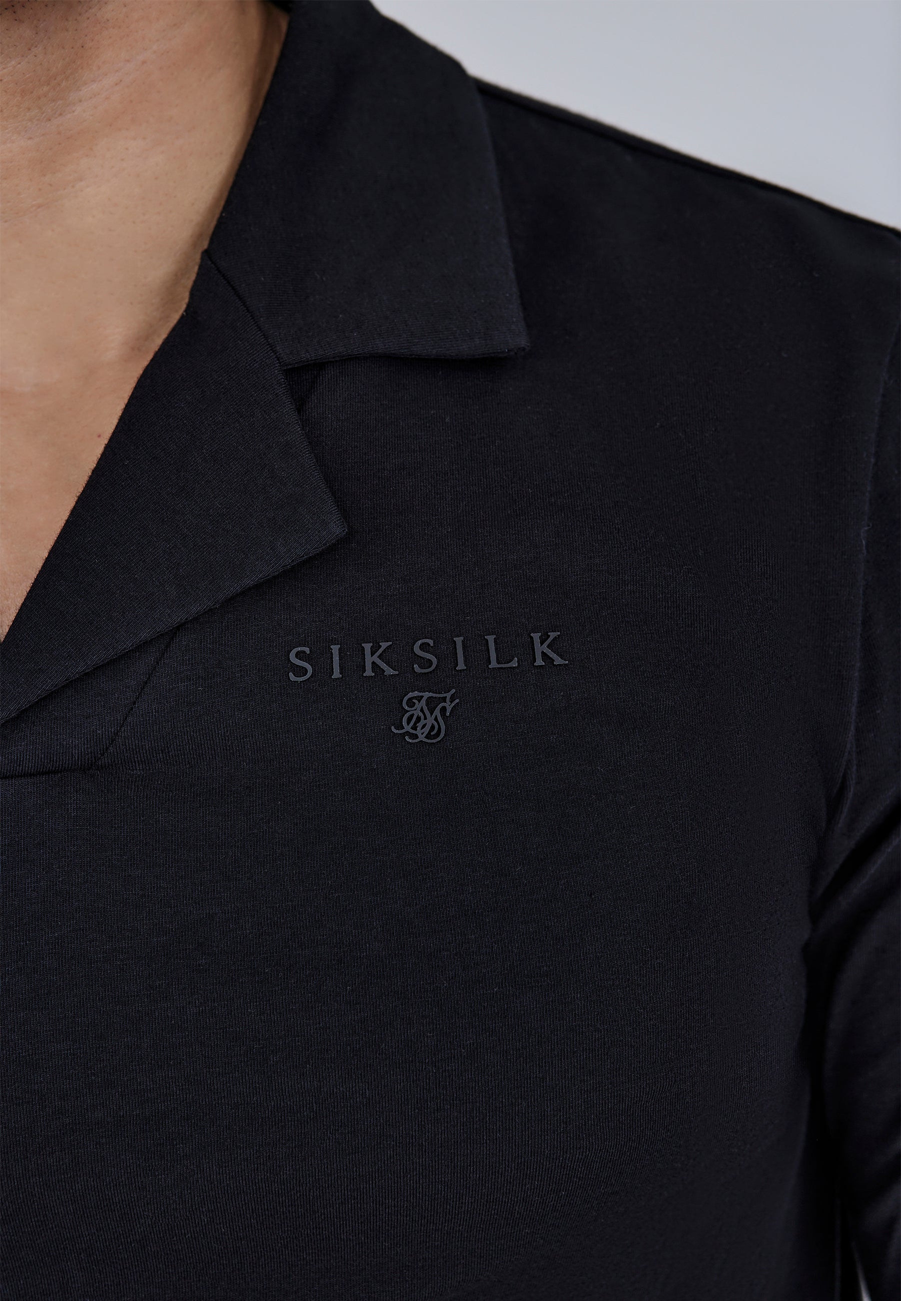 Polo à manches longues en noir T-shirts SikSilk