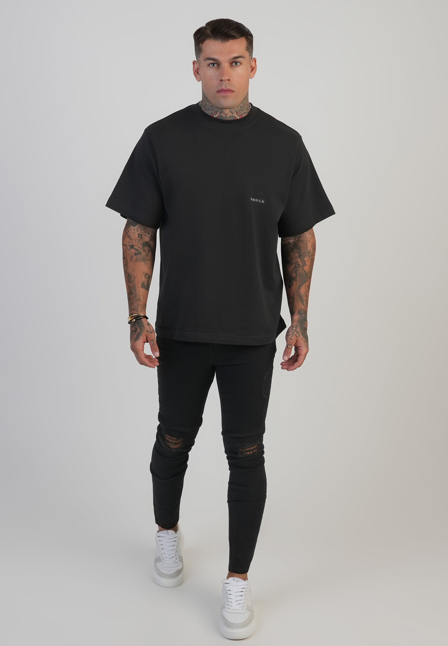 Jeans Distressed Skinny en noir Jeans SikSilk