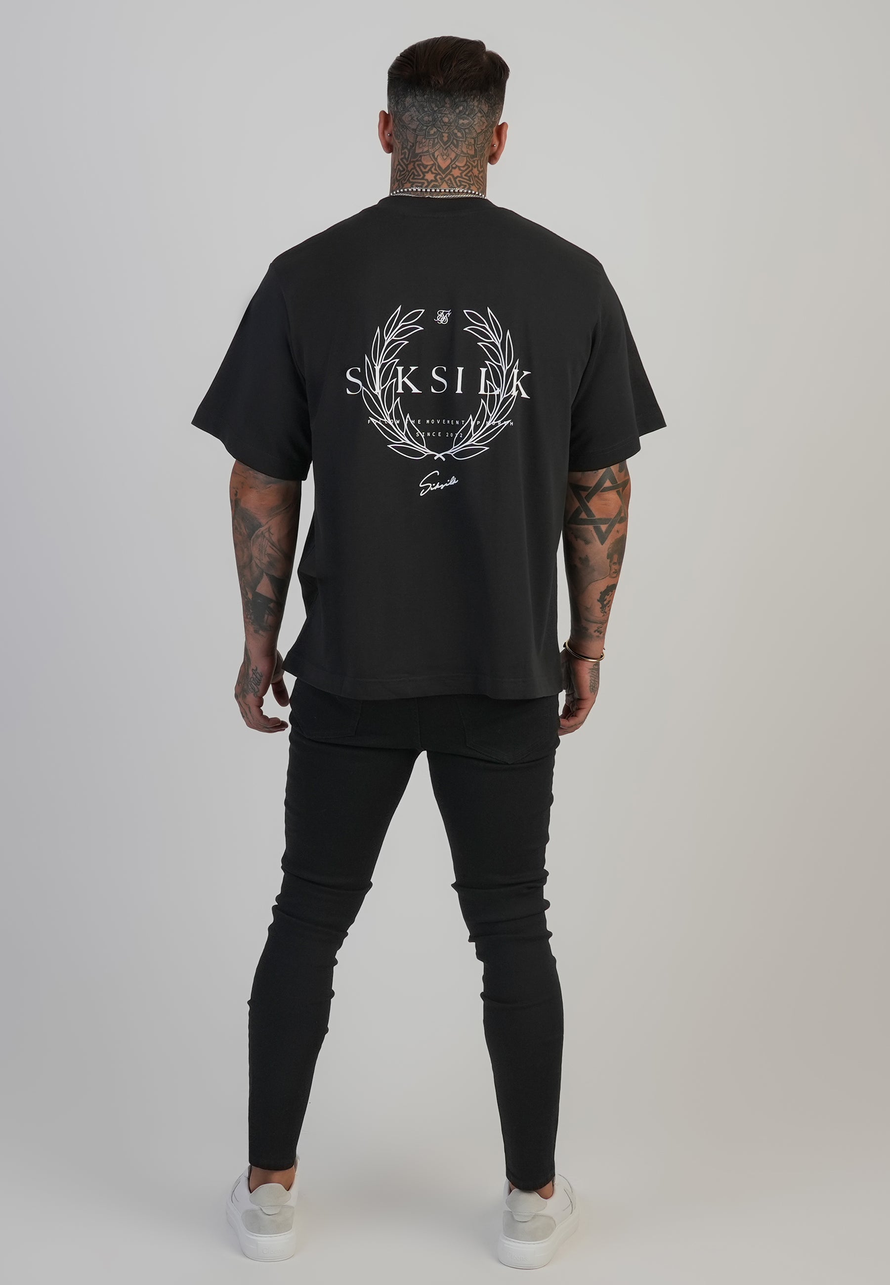 Jeans Distressed Skinny en noir Jeans SikSilk