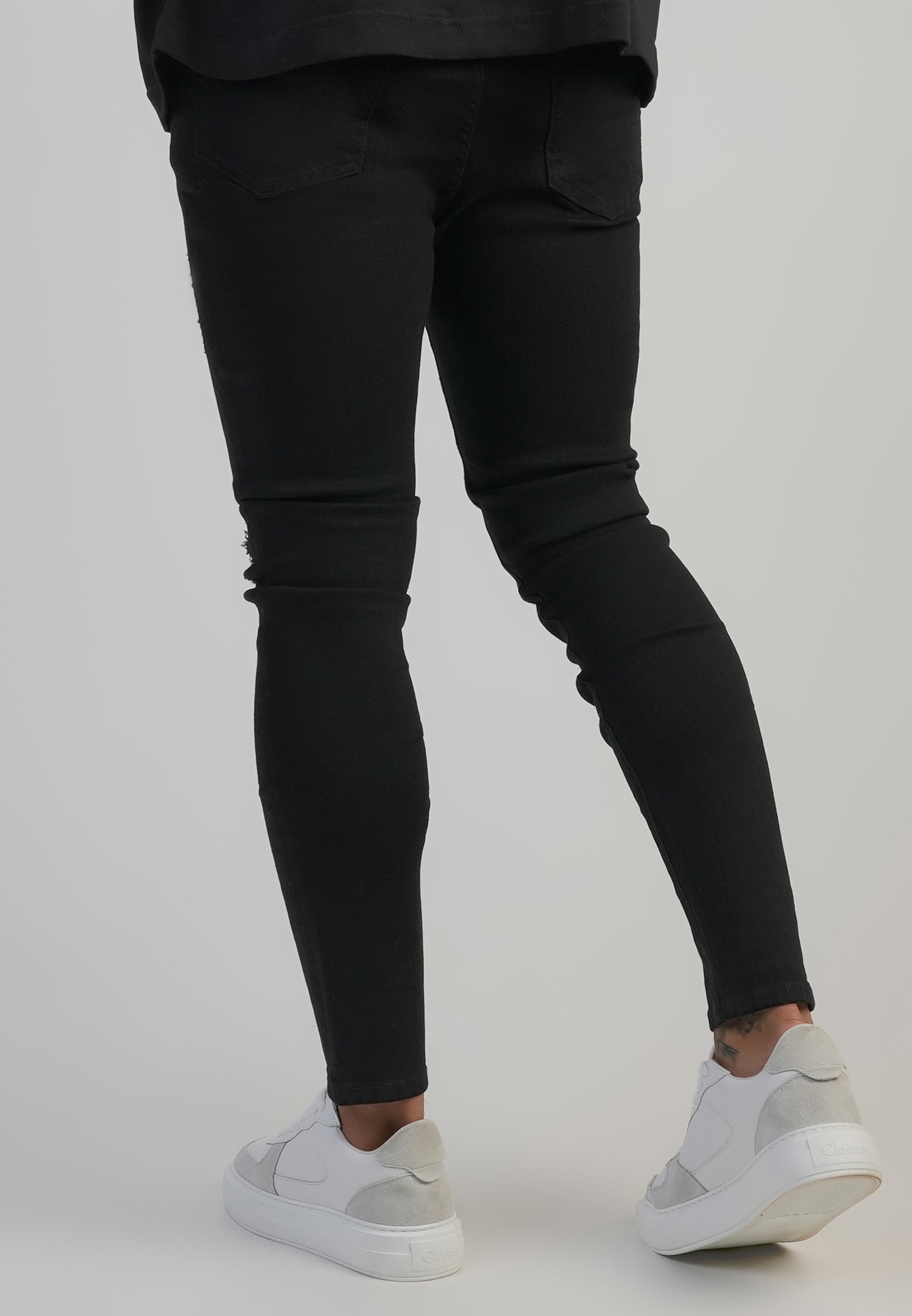 Jeans Distressed Skinny en noir Jeans SikSilk