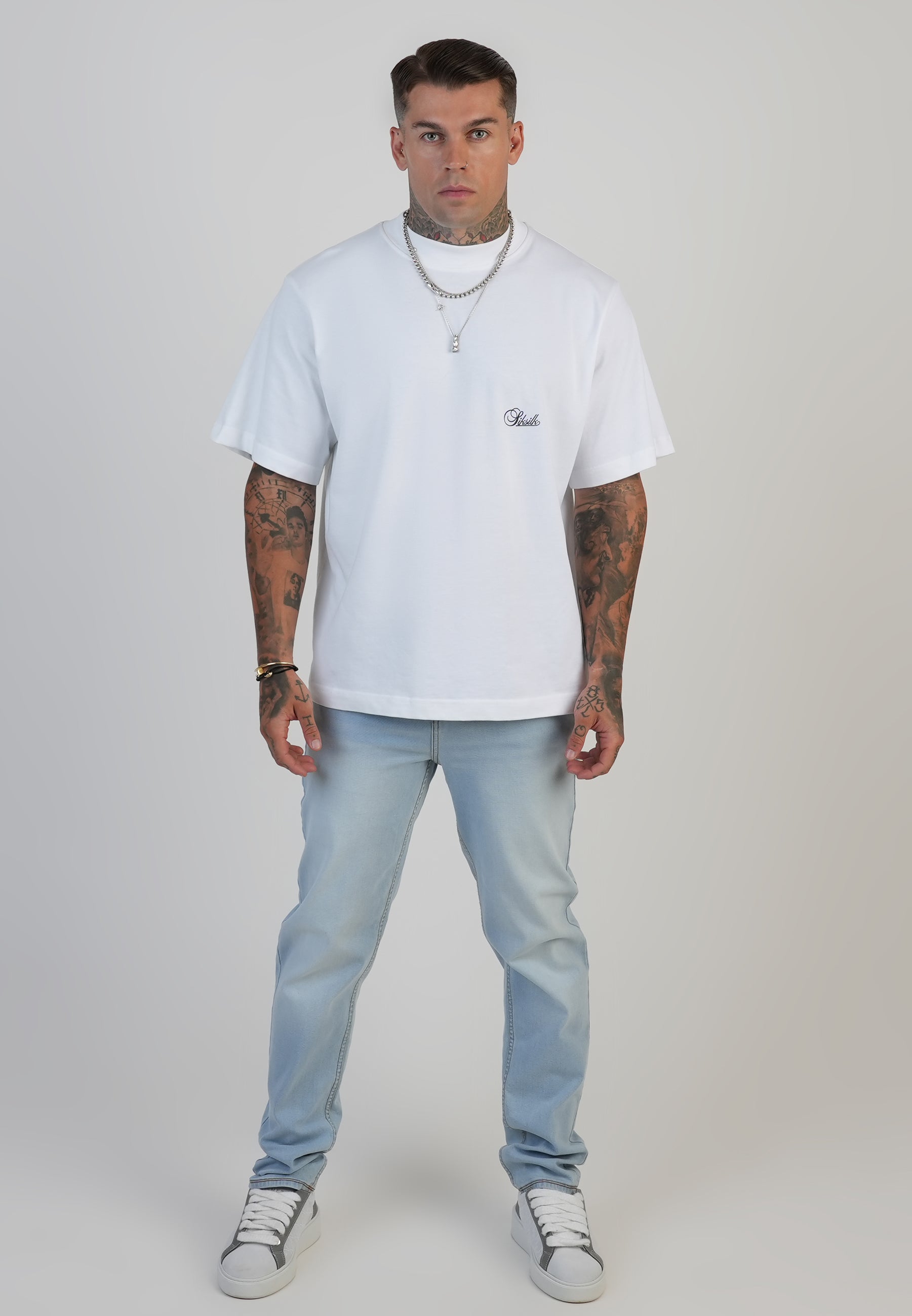 Jeans Slim Fit en bleu clair délavé Jeans SikSilk