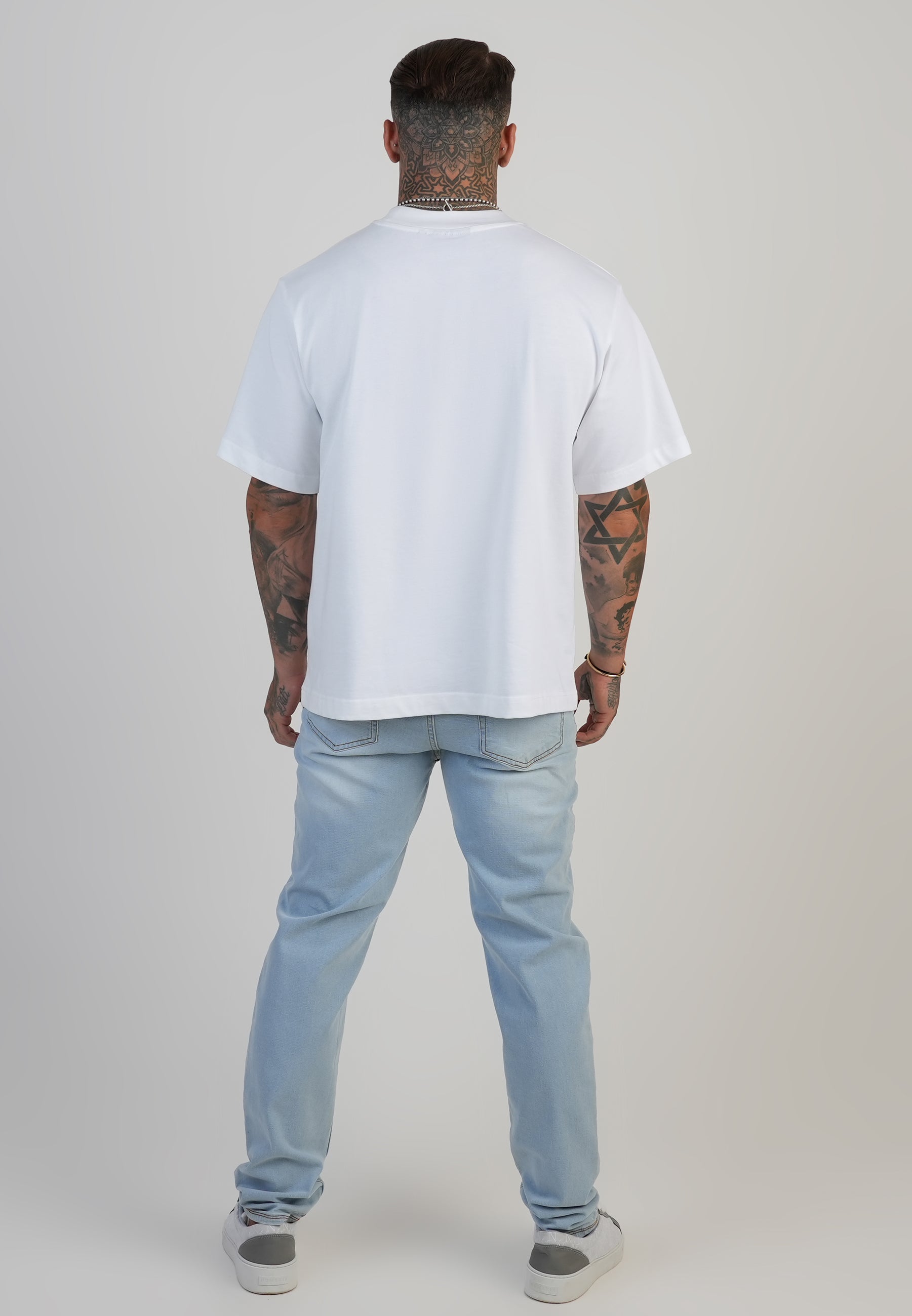 Jeans Slim Fit en bleu clair délavé Jeans SikSilk