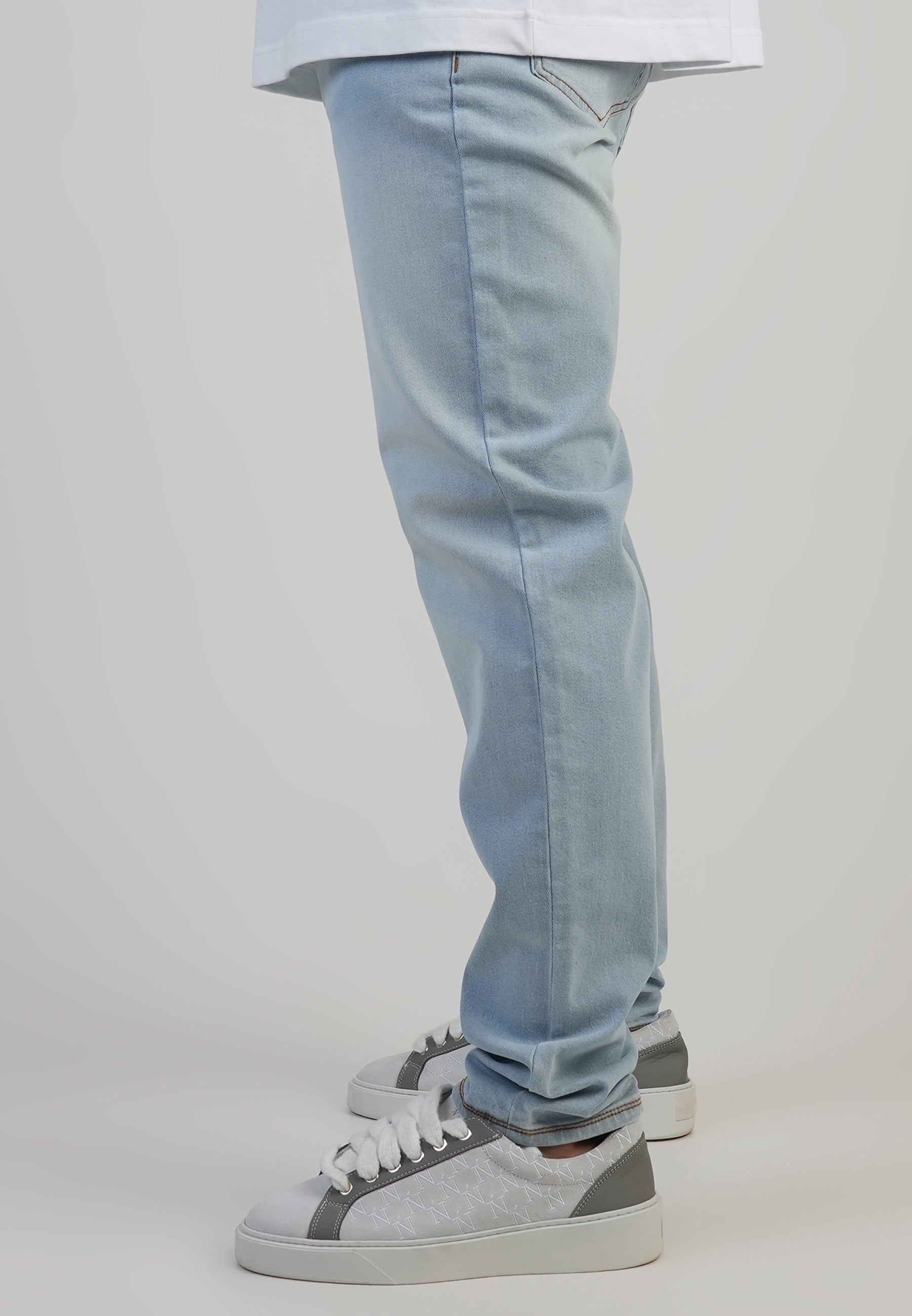 Jeans Slim Fit en bleu clair délavé Jeans SikSilk