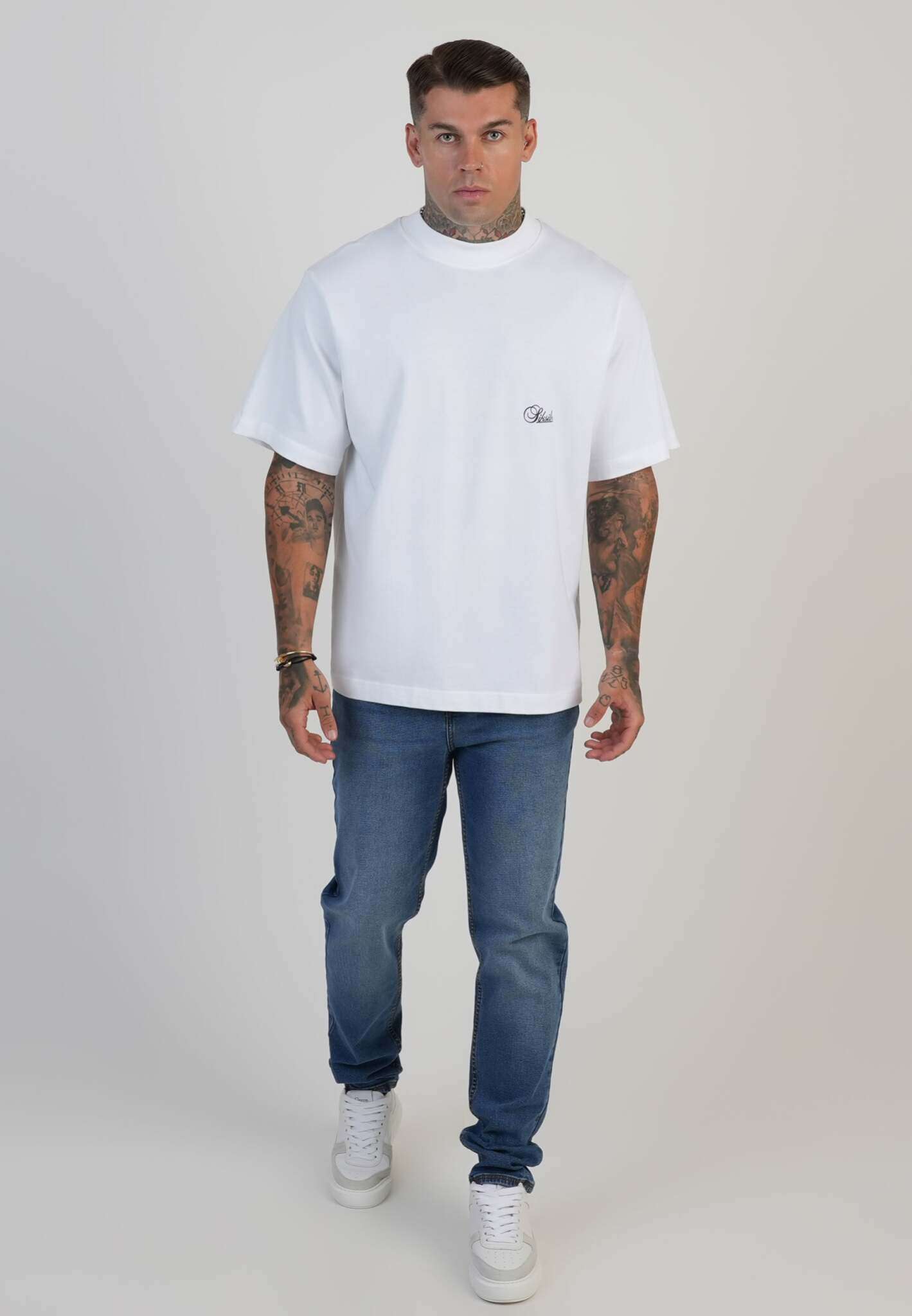 Jeans Slim Fit en bleu moyen délavé Jeans SikSilk