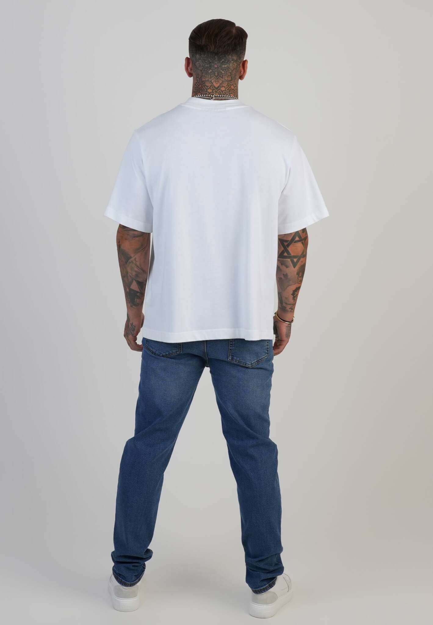 Jeans Slim Fit en bleu moyen délavé Jeans SikSilk