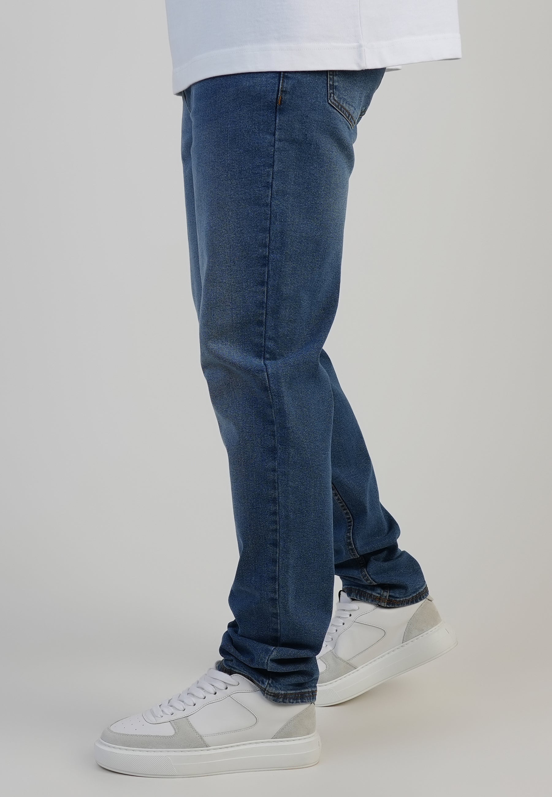 Jeans Slim Fit en bleu moyen délavé Jeans SikSilk