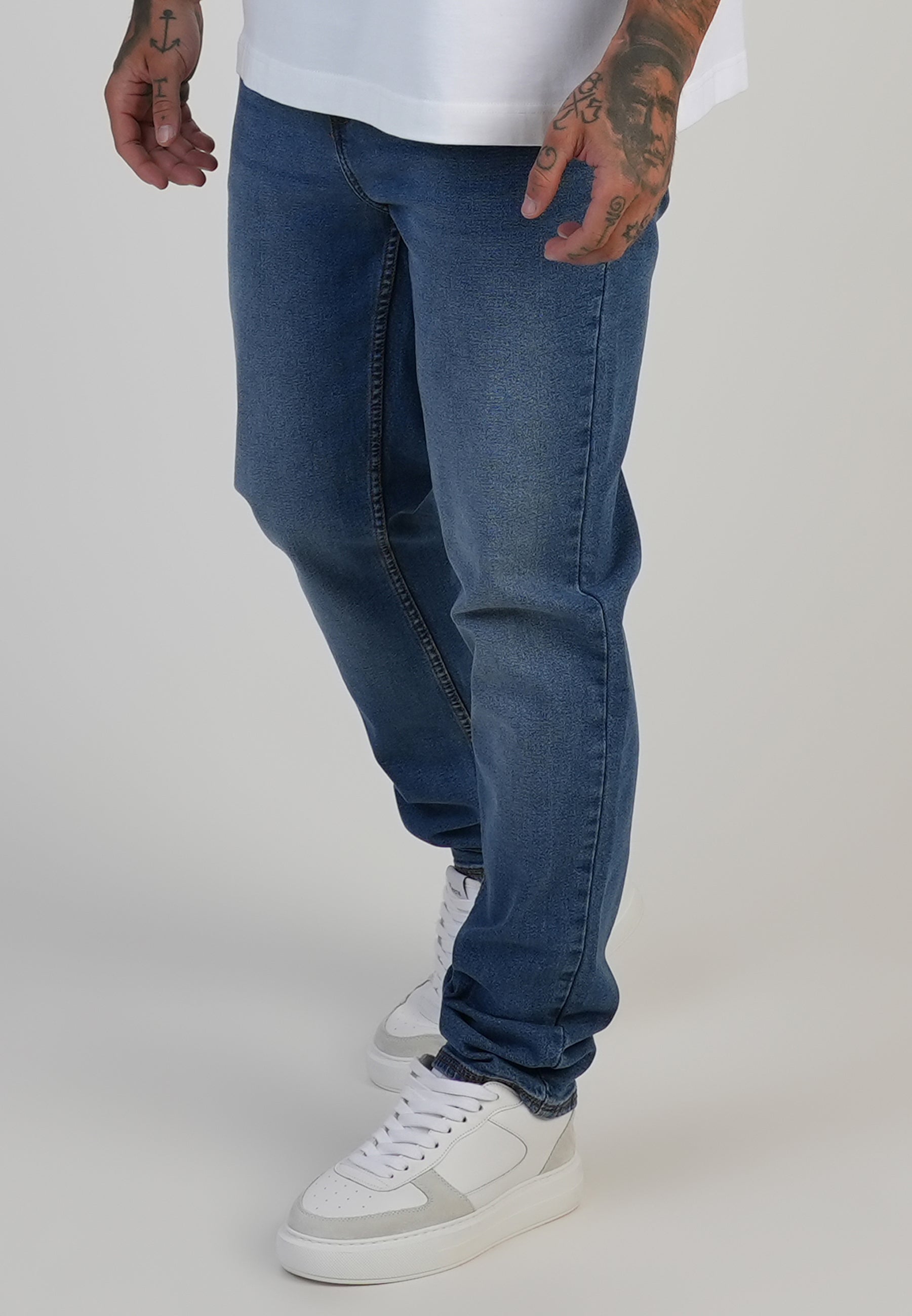 Jeans slim en bleu moyen délavé