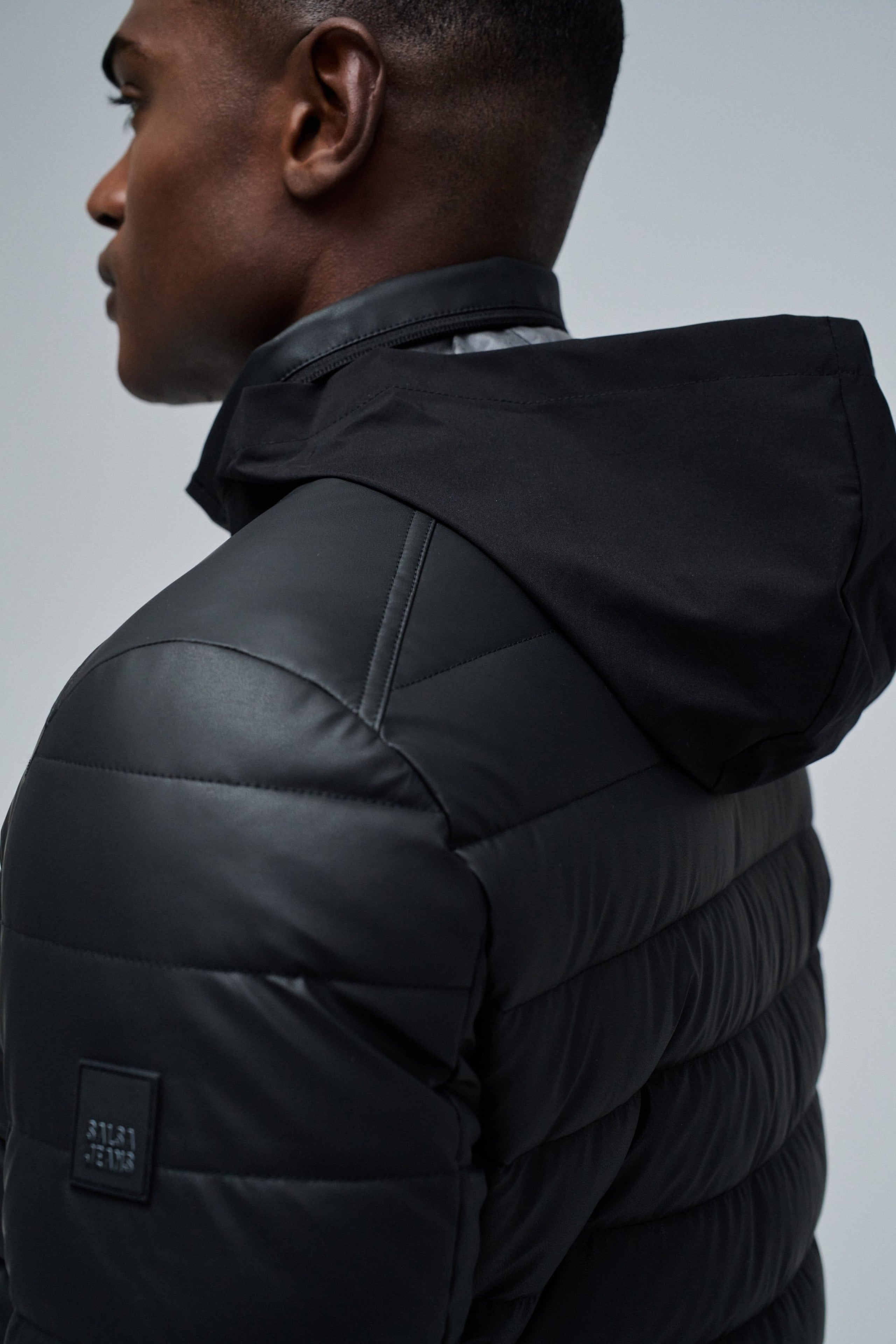 Veste en cuir PU léger rembourré en noir