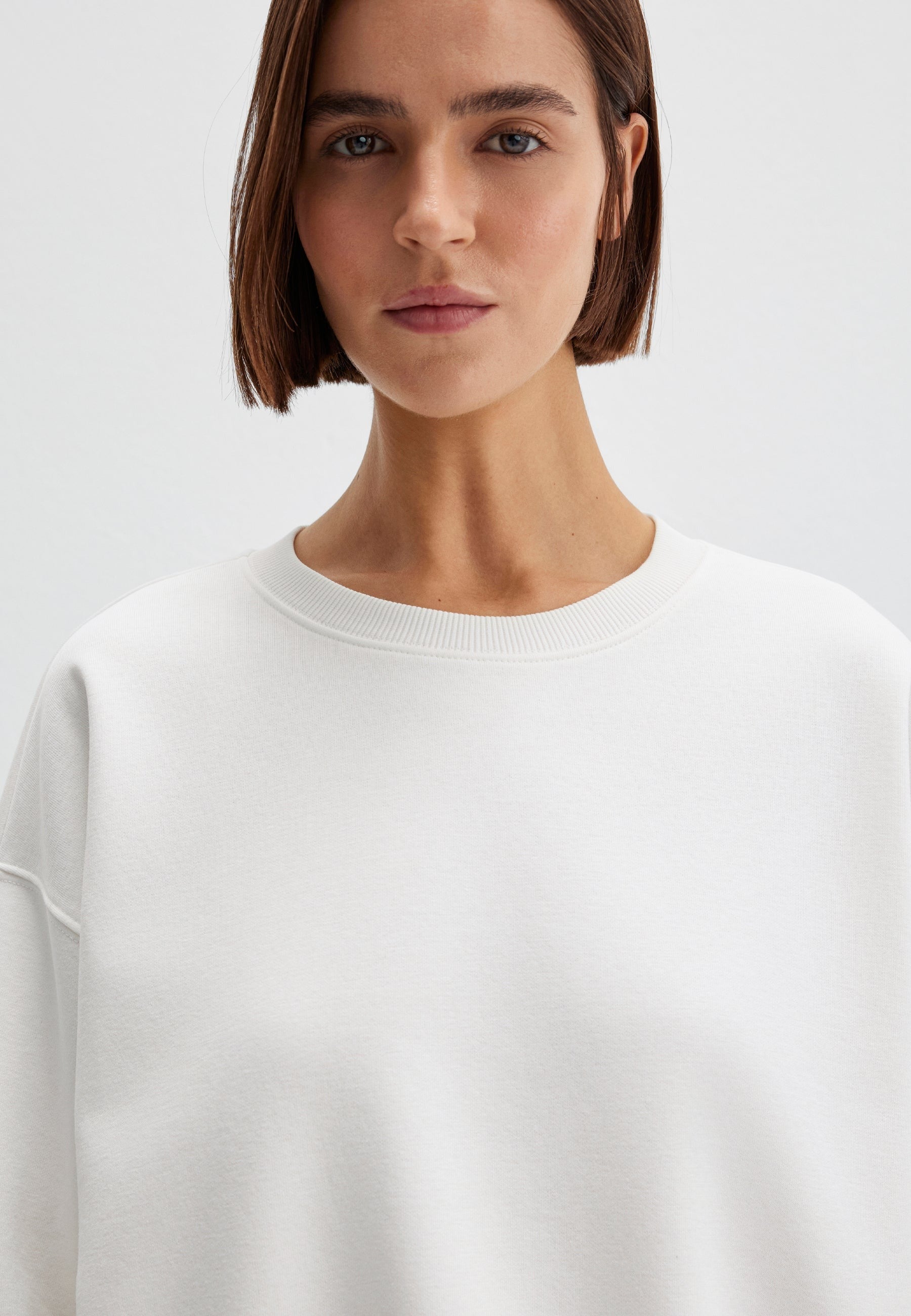 Sweat-shirt à col rond blanc antique