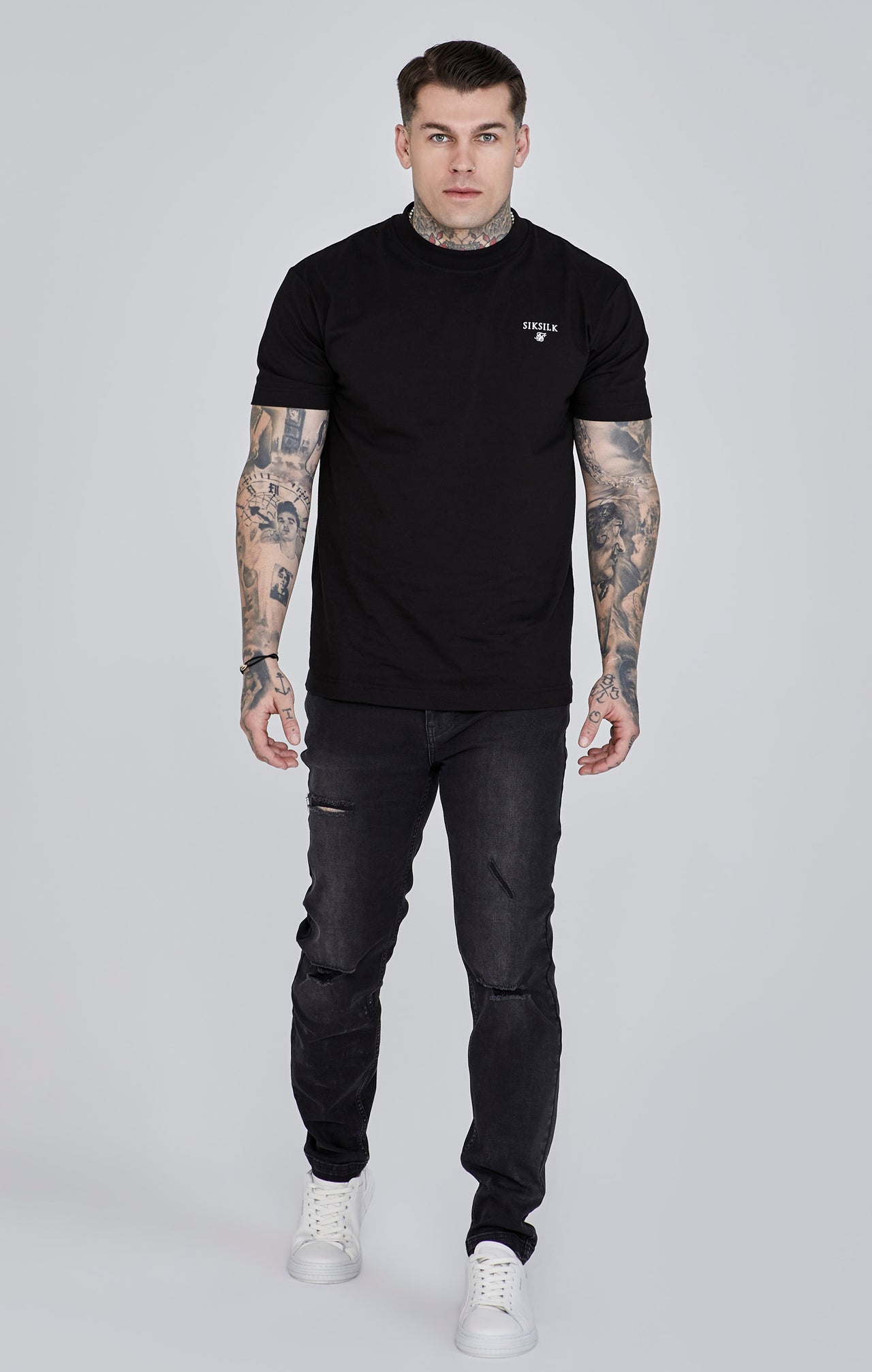 Jeans Distressed Slim Fit en noir Jeans SikSilk   