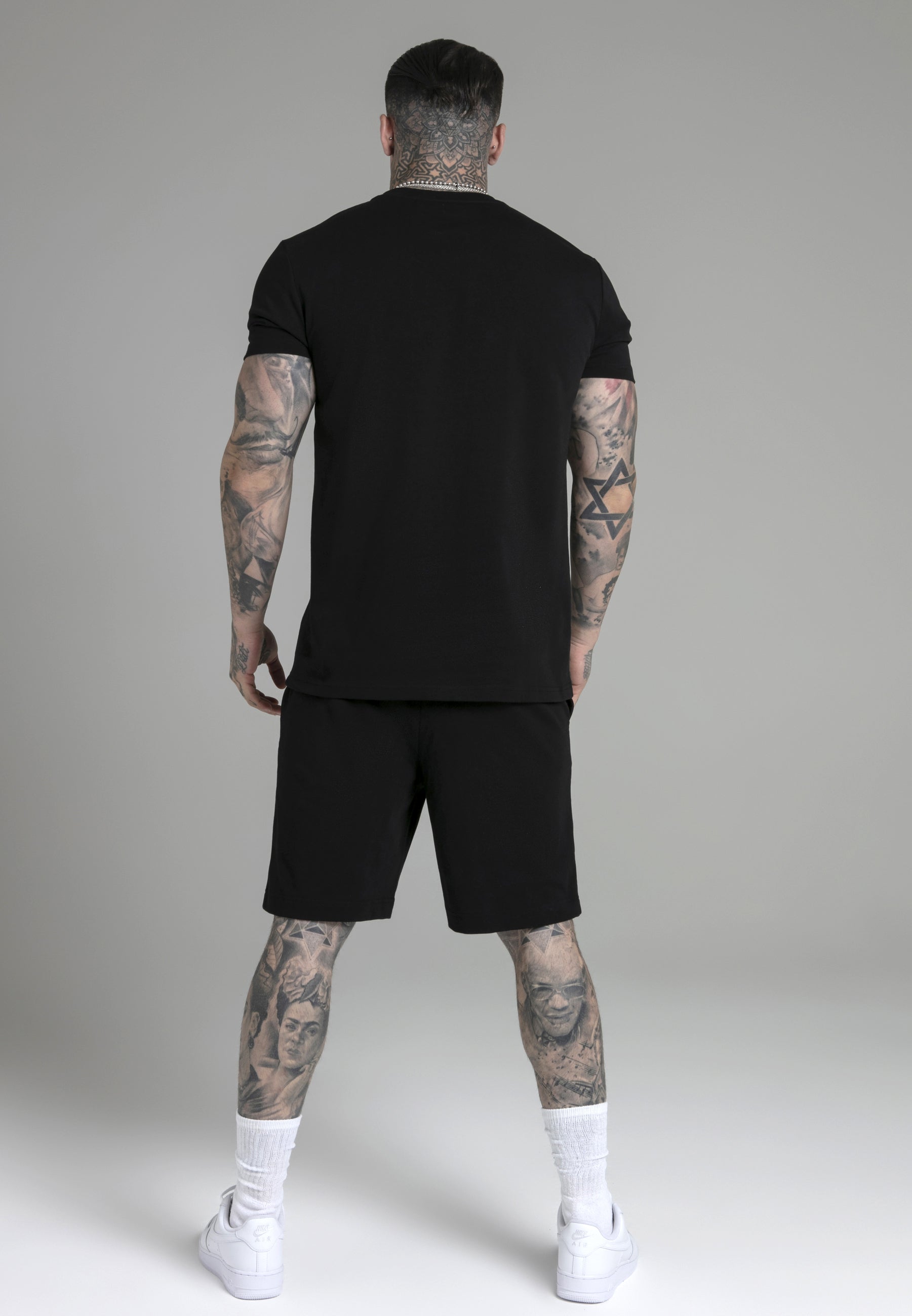 Ensemble t-shirt et short en noir Sets SikSilk   