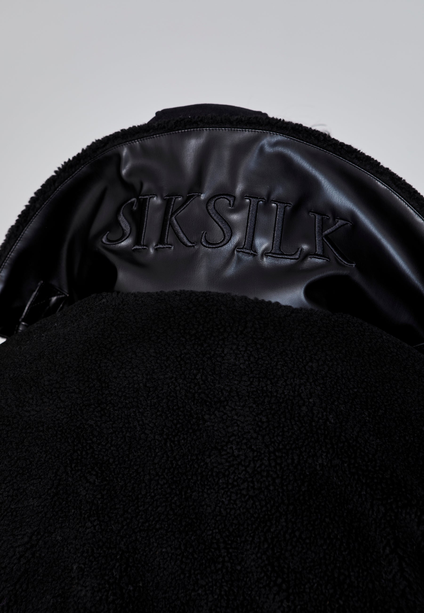 Sherpa Bomber Jacket in Black Vestes SikSilk   