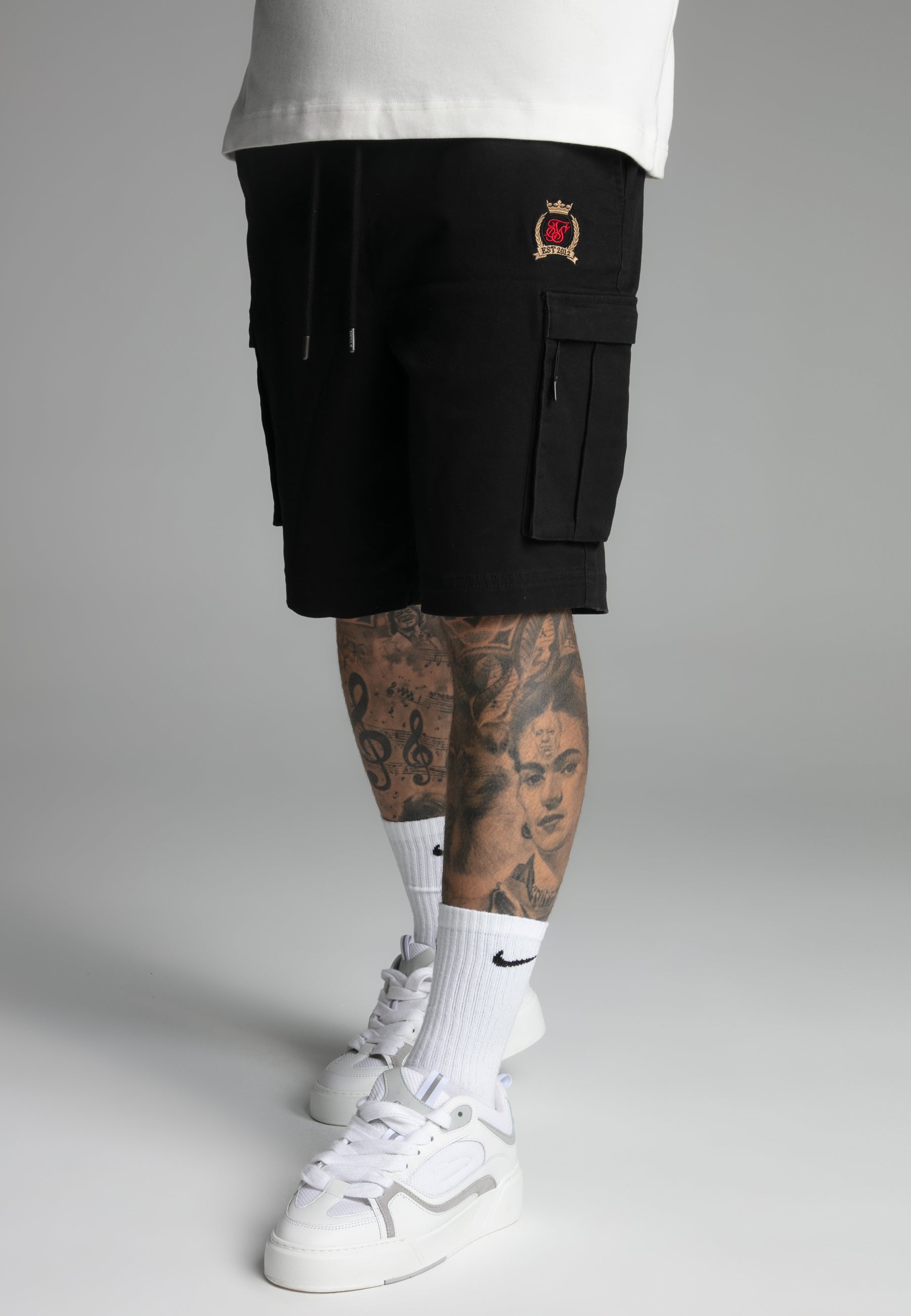 Short Cargo dans Black Short SikSilk