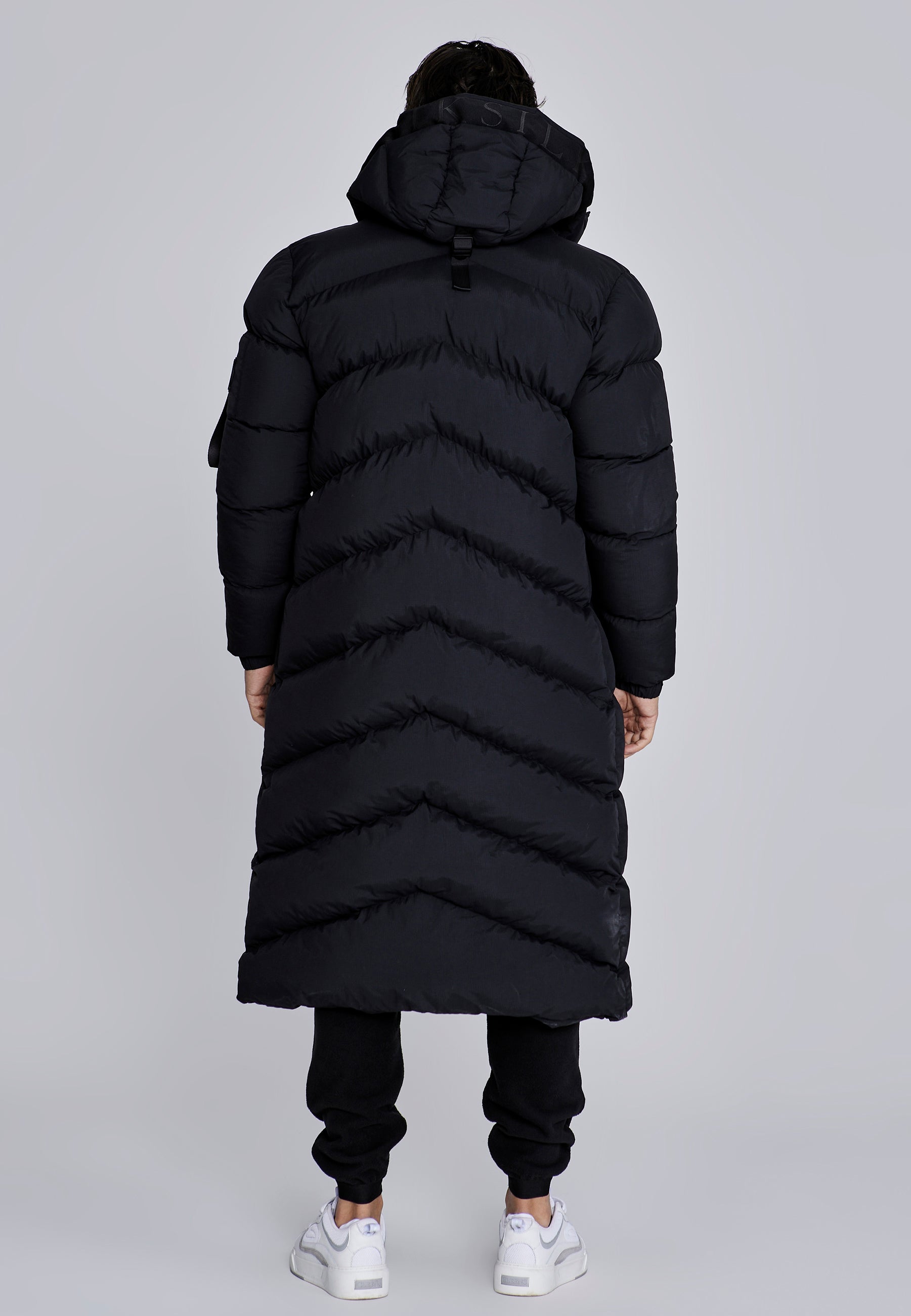 Longline Puffer in Black Vestes SikSilk