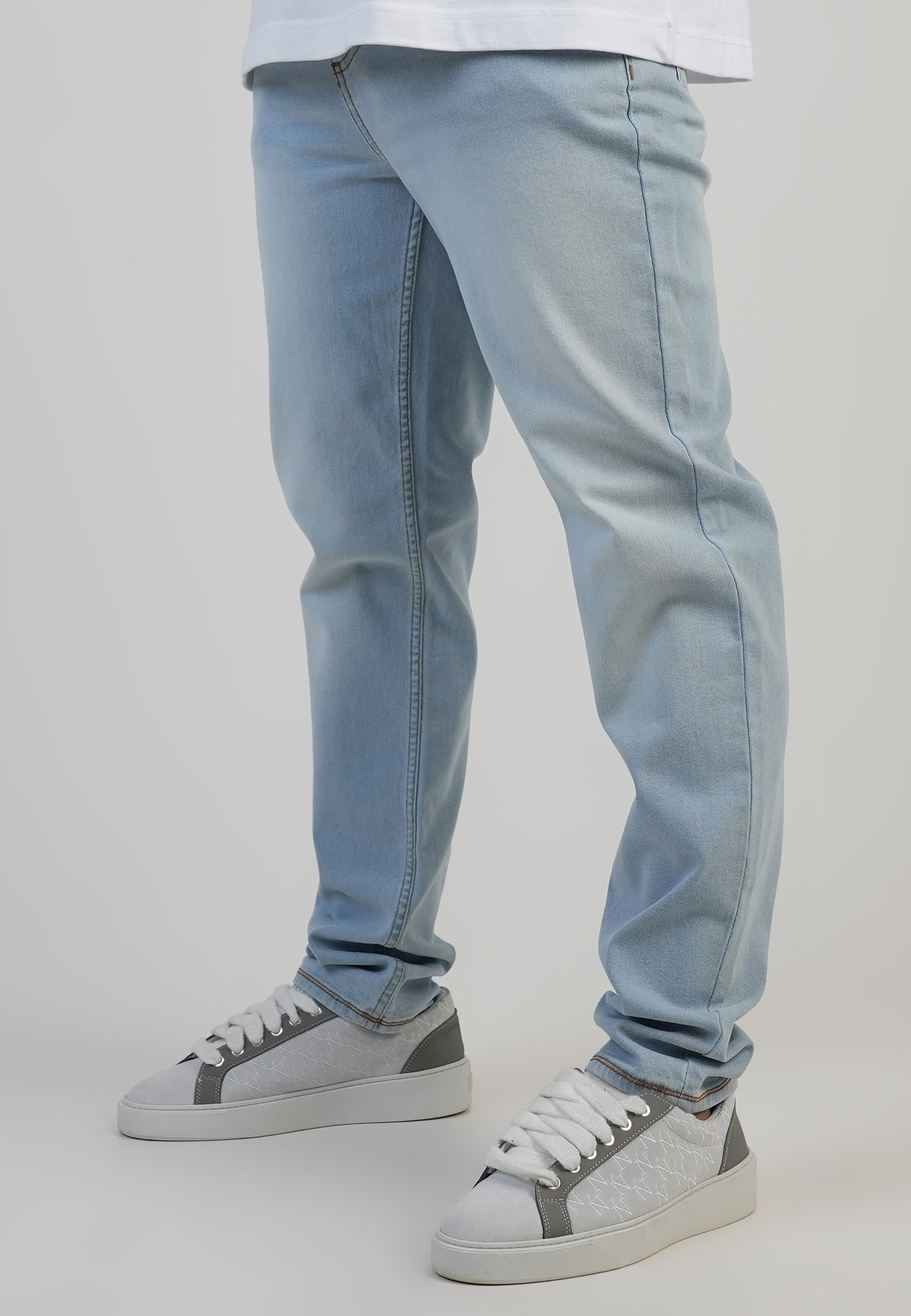 Jeans Slim Fit en bleu clair délavé Jeans SikSilk