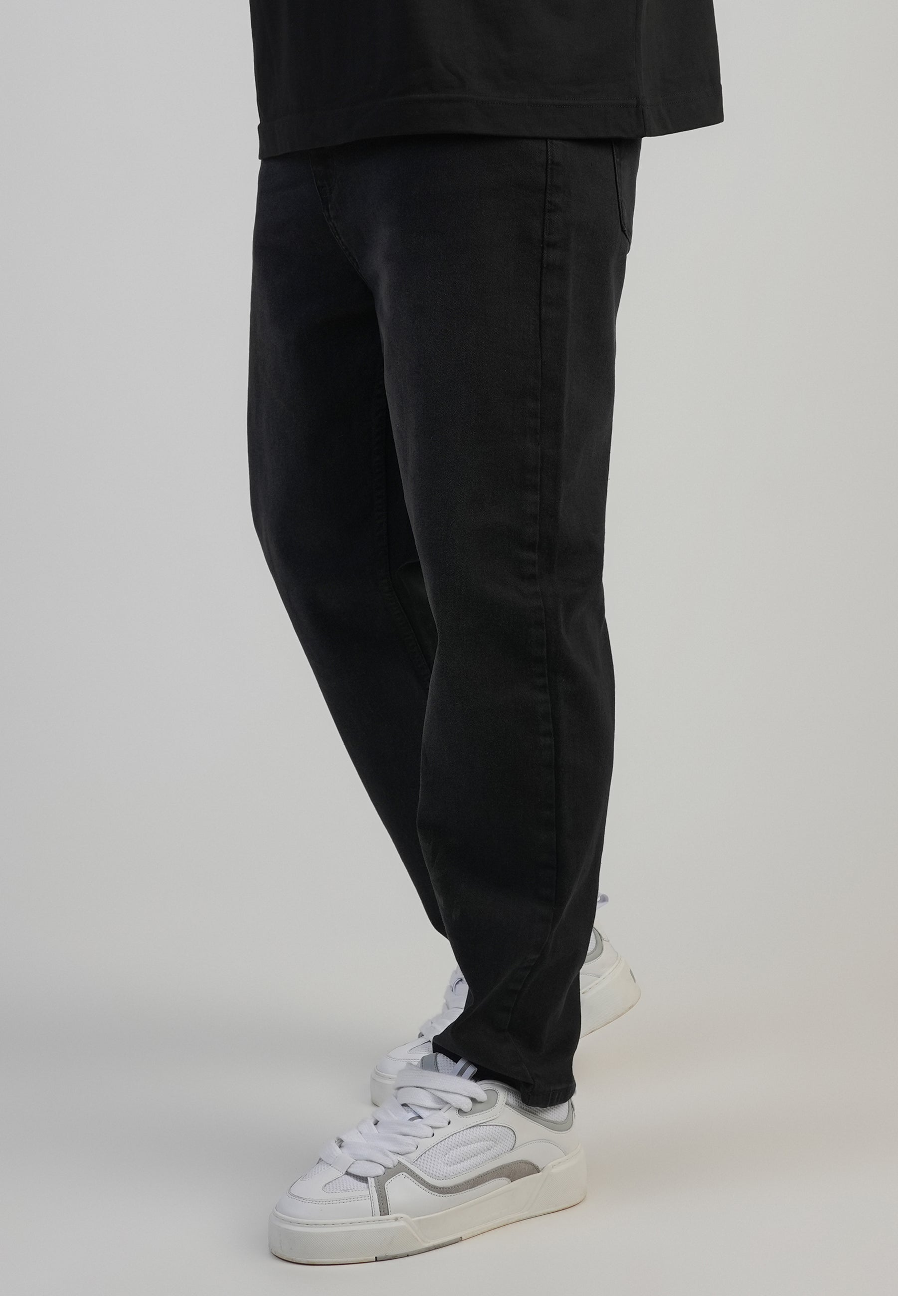 Jeans Tapered Fit en Washed Black Jeans SikSilk