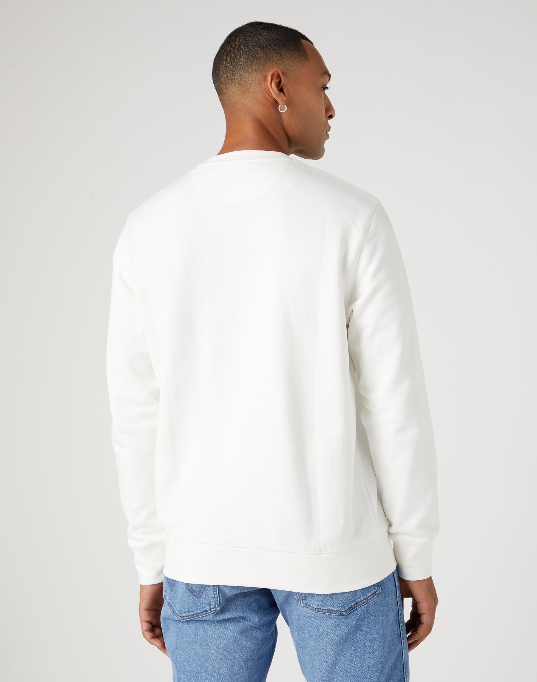 Sign Off Crew in Worn White Sweatshirts Wrangler   